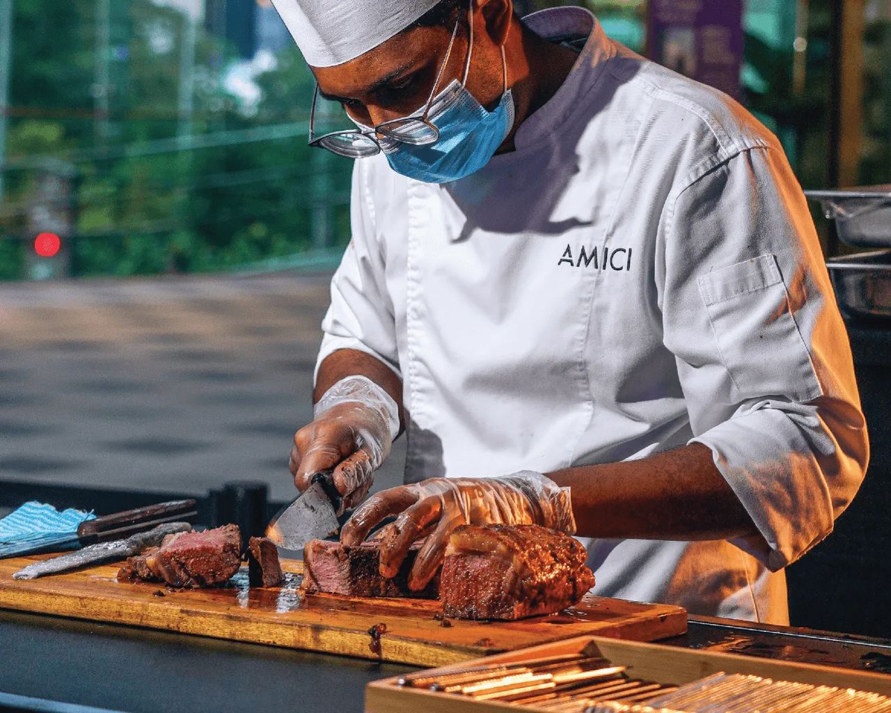 AMICI chef carving at a live station
