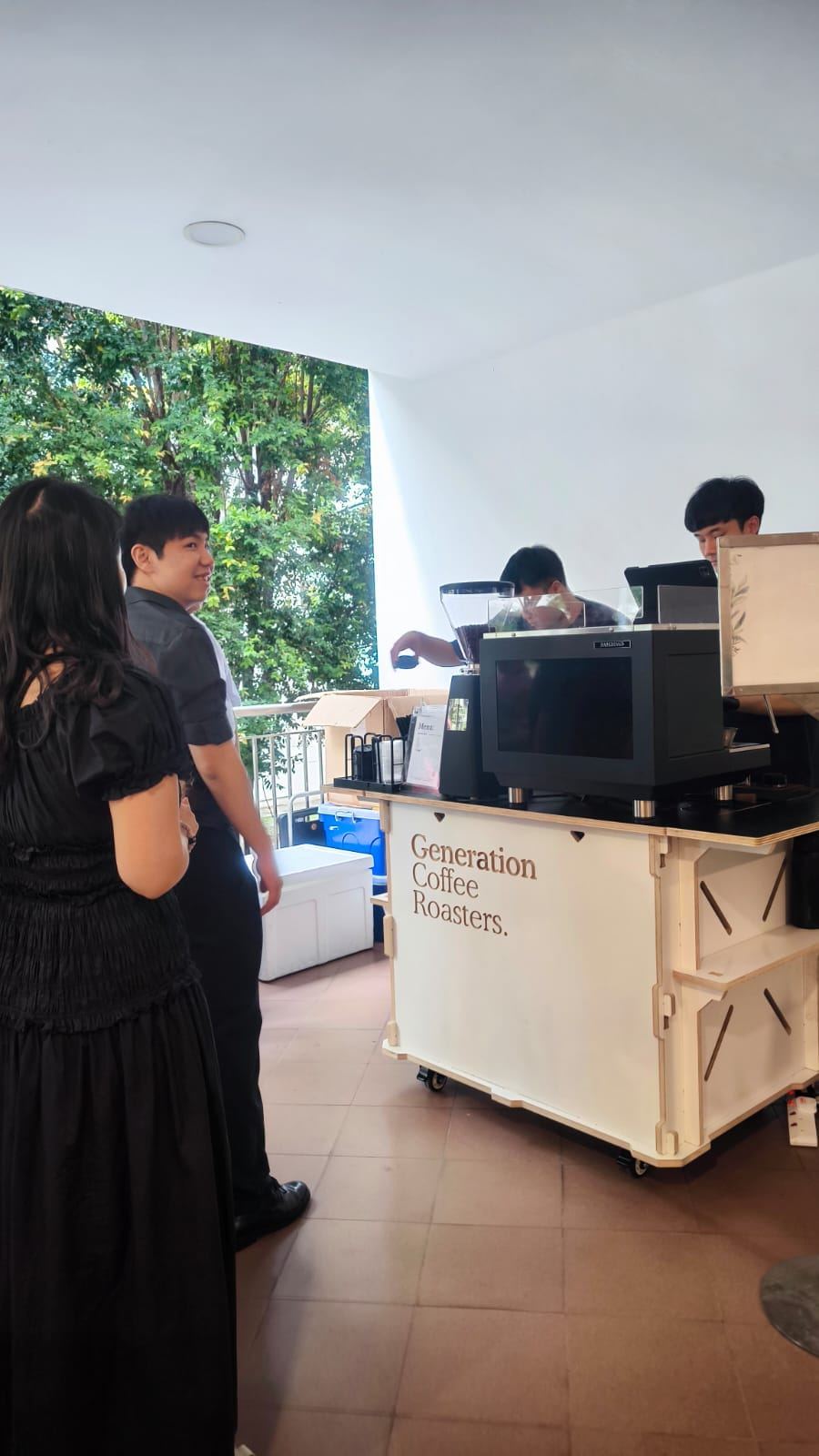 Wedding guests visiting the Generation Coffee Roasters coffee cart