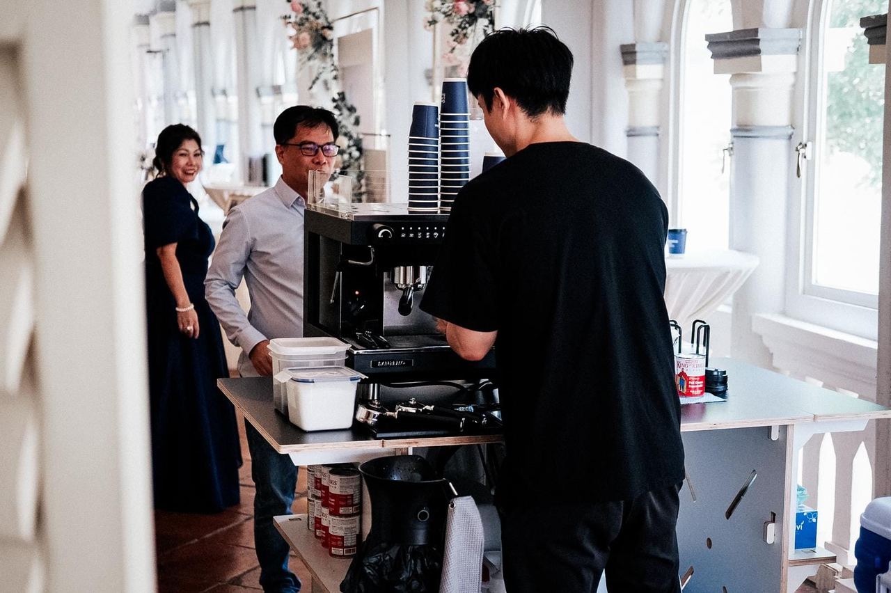Generation Coffee Roasters barista serving guests at a wedding reception