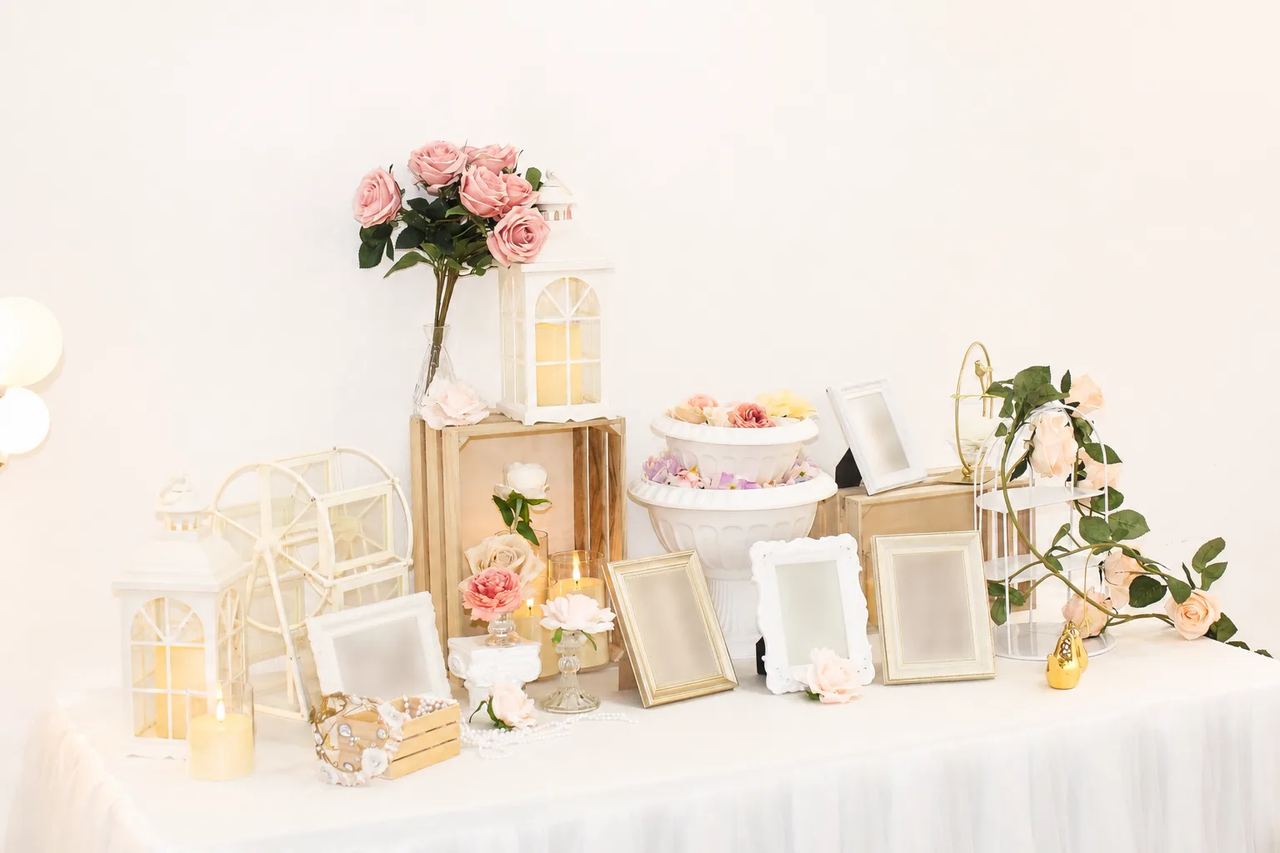 Fairytale wedding reception table with angpao box and photo frames