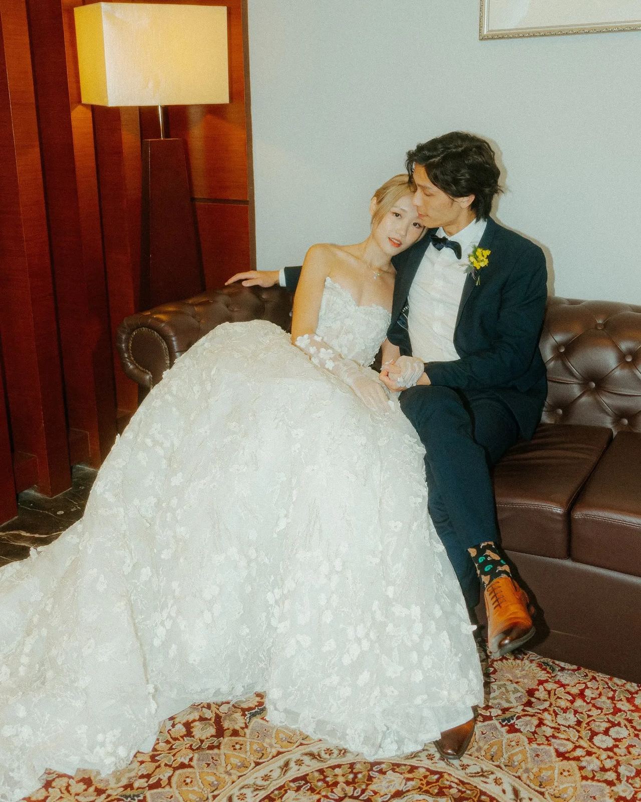 Bride and groom seated together on their wedding day