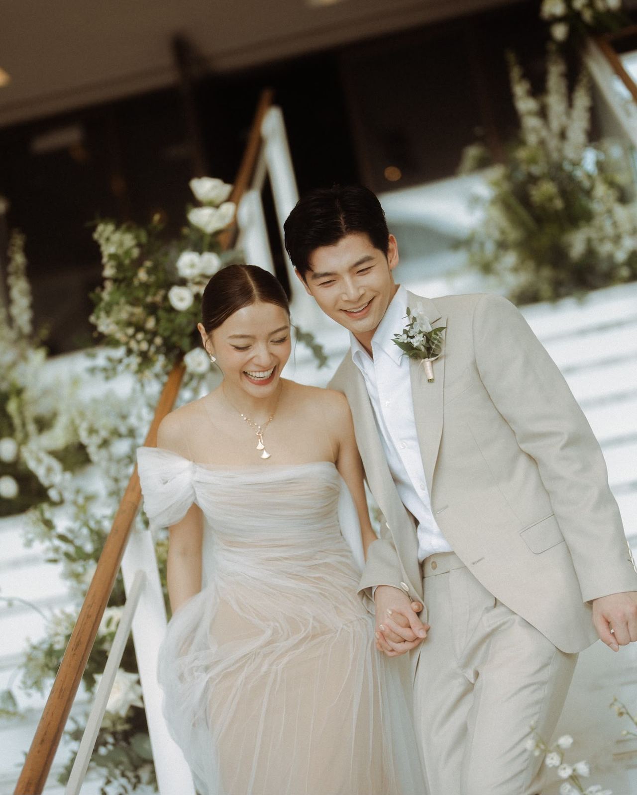 Bride and groom walking together during their wedding ceremony