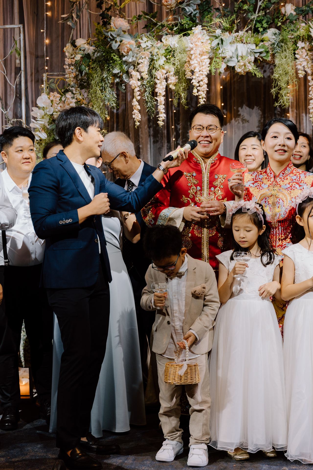 Emcee Rayson hosting a lively wedding family moment