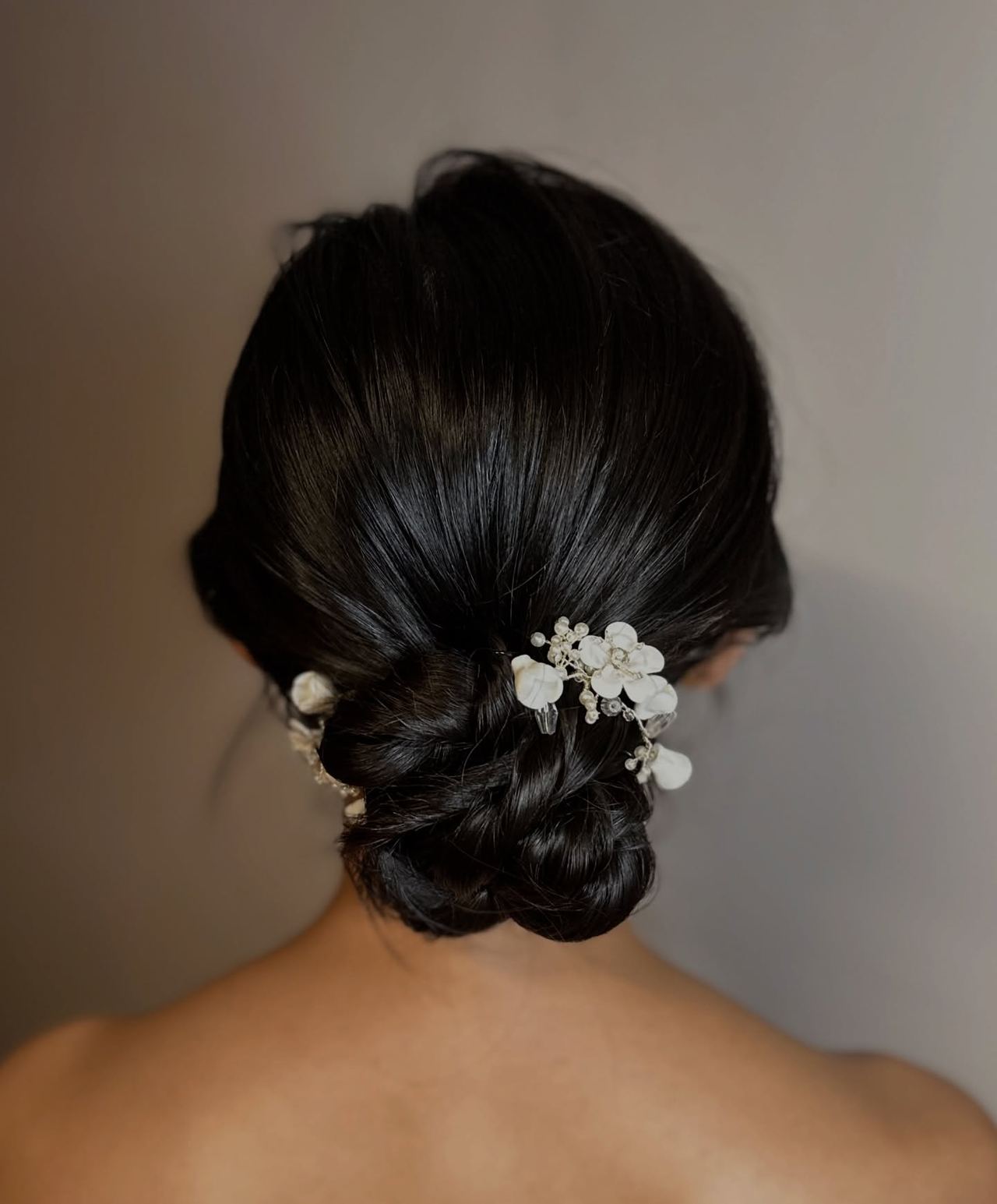 Classic bridal low bun by Clara Song Bridal