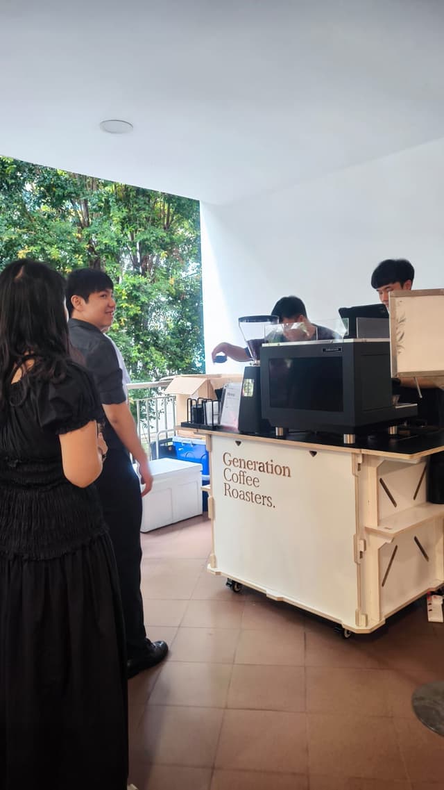 Wedding guests visiting the Generation Coffee Roasters coffee cart
