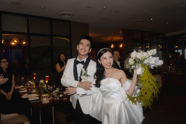 Newlyweds entering their reception at Altro Zafferano