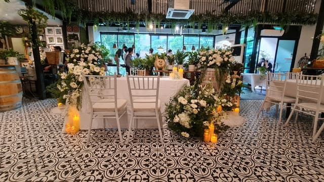 Couple's solemnisation table and floral arrangement at Knots Cafe & Living