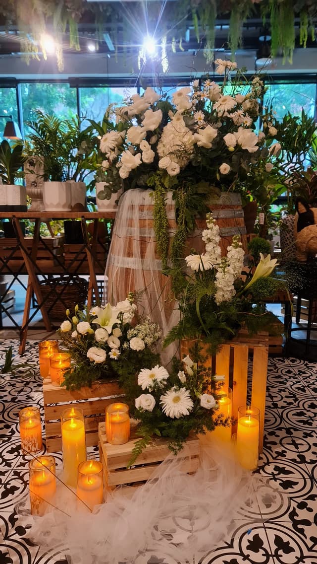 White floral ceremony arrangement at Knots Cafe & Living