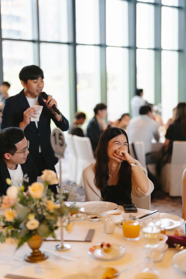 Emcee Rayson leading a wedding guest interaction
