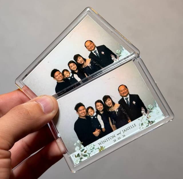 A personalised photo keychain produced by Peculiar Booth
