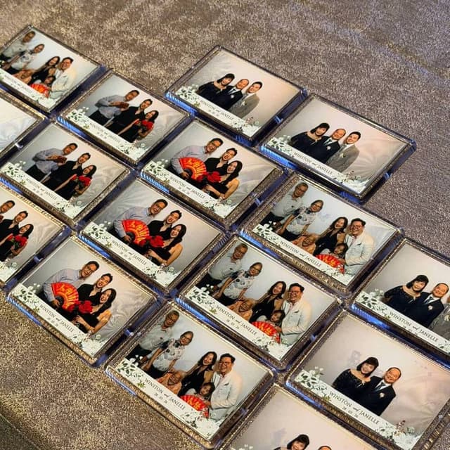 Rows of personalised photo magnets produced for wedding guests